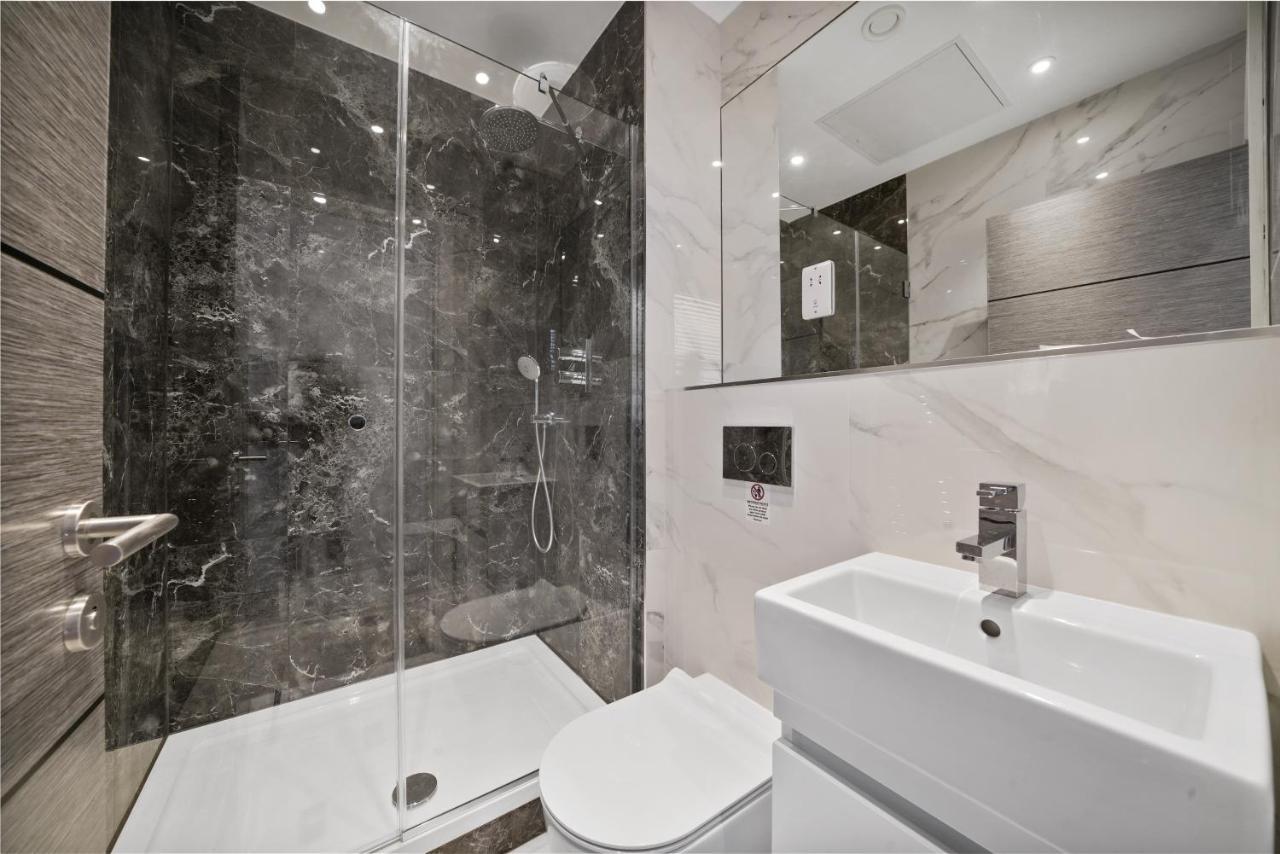 คอลลิงแฮม ไพร์ม อพาร์ตเมนต์ Aparthotel ลอนดอน ภายนอก รูปภาพ Bathroom