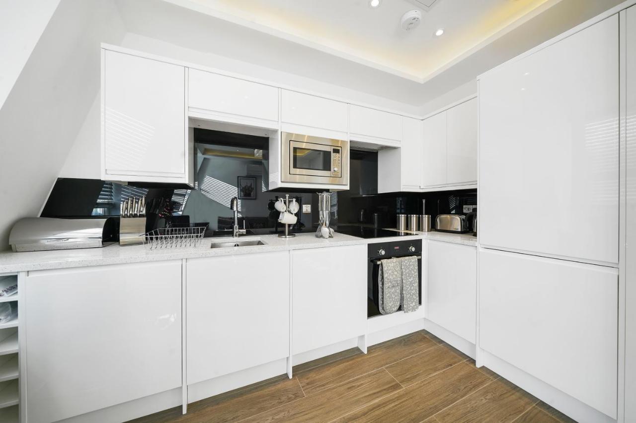 คอลลิงแฮม ไพร์ม อพาร์ตเมนต์ Aparthotel ลอนดอน ภายนอก รูปภาพ A modern kitchen