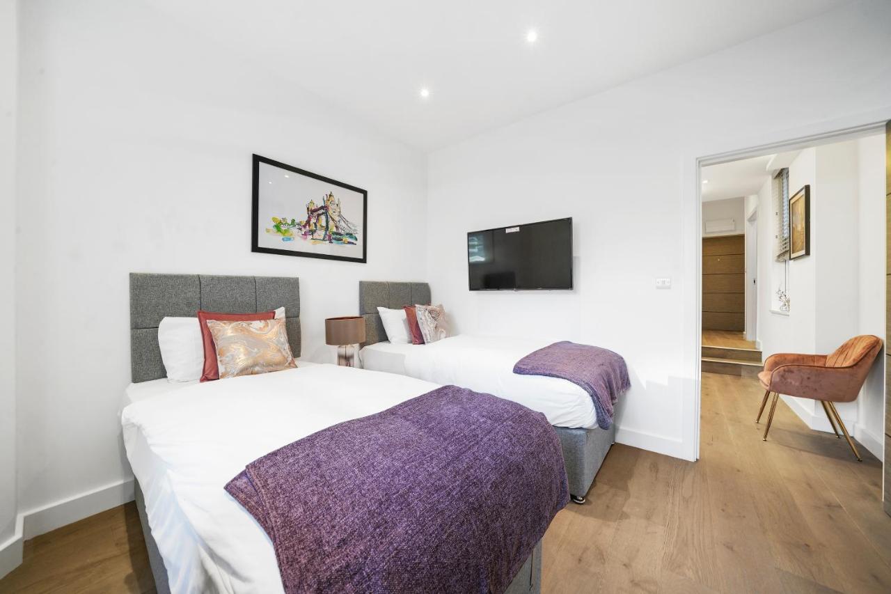 คอลลิงแฮม ไพร์ม อพาร์ตเมนต์ Aparthotel ลอนดอน ภายนอก รูปภาพ A typical bedroom at the hotel